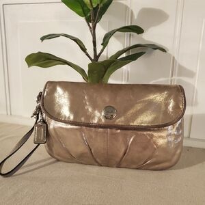 COACH - Metalic Gold Wristlet w/Purple Lining
